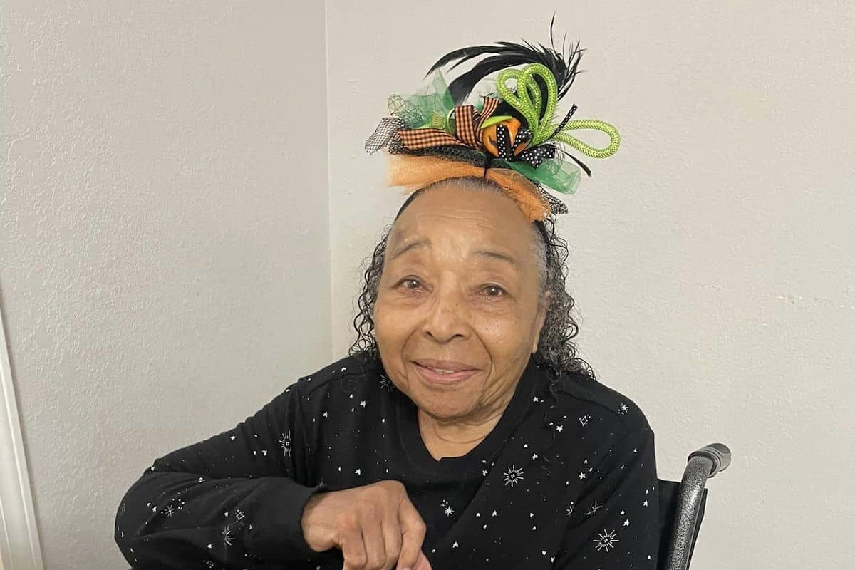 Known Memory Care | Senior wearing a fun hat