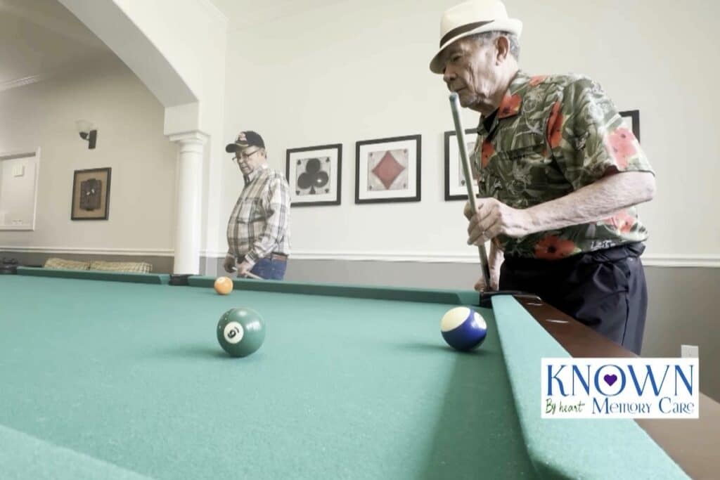 Known Memory Care | Residents playing pool