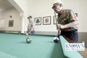 Known Memory Care | Residents playing pool